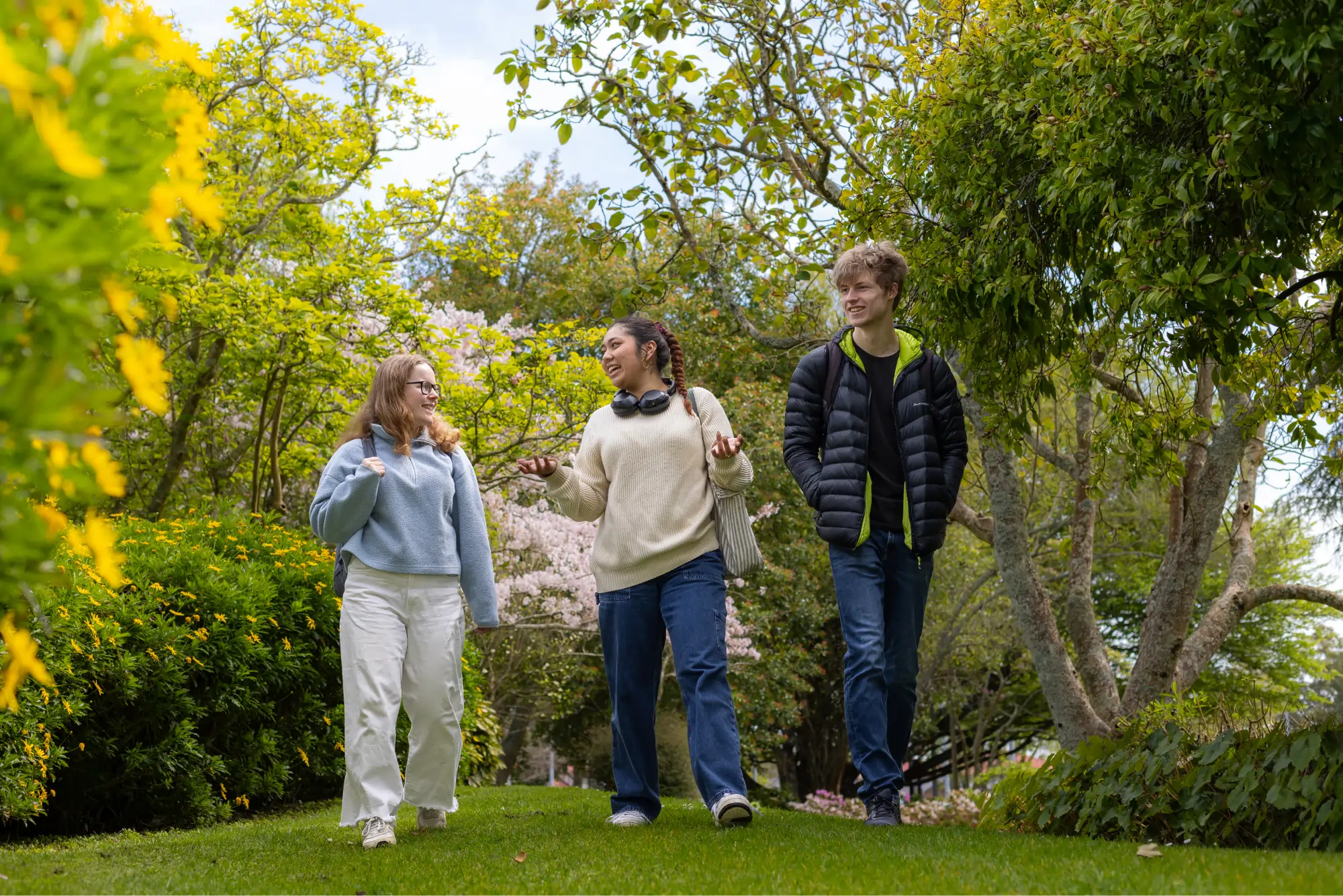 group-of-students-walking-outside