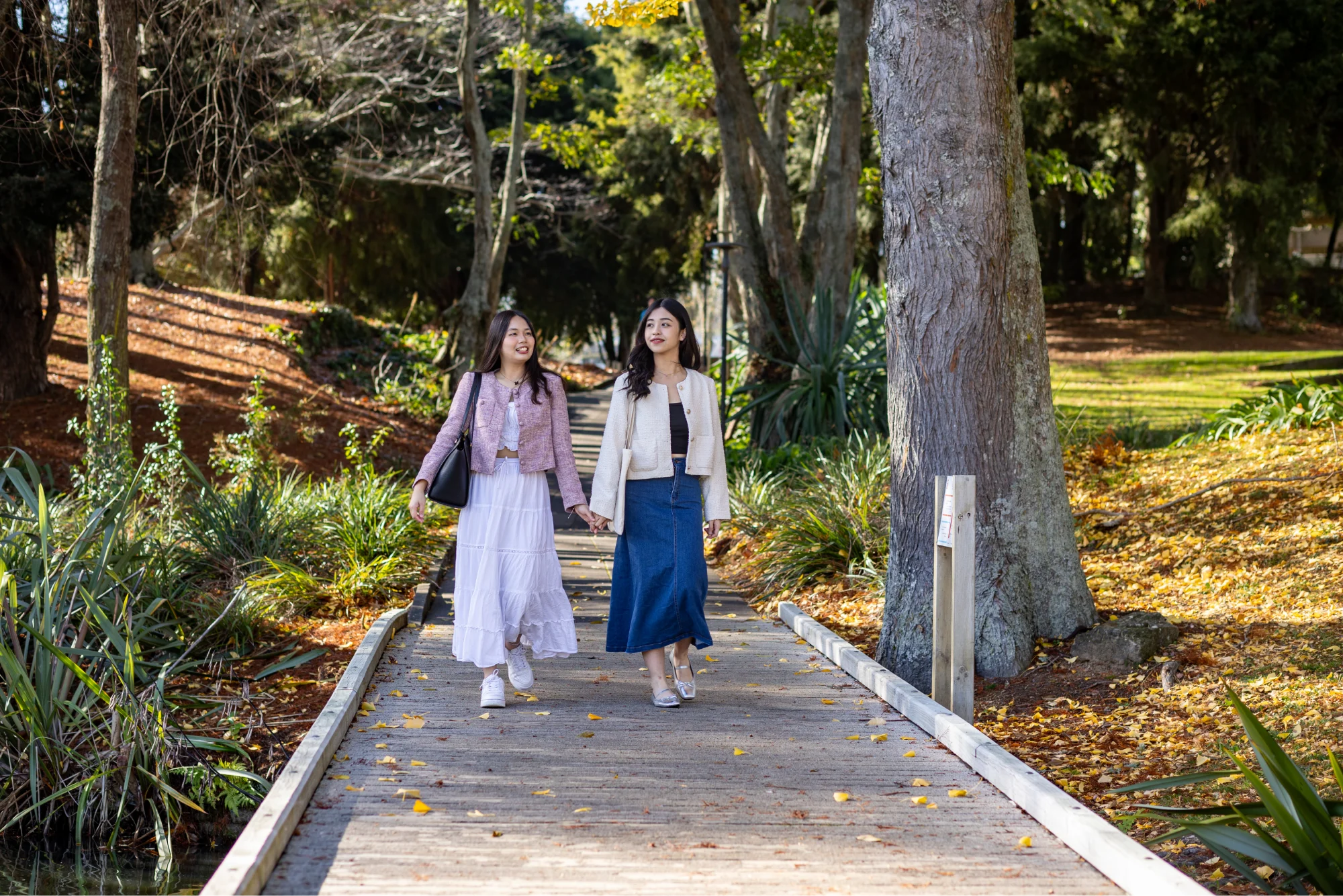 international-students-walking-across-bridge