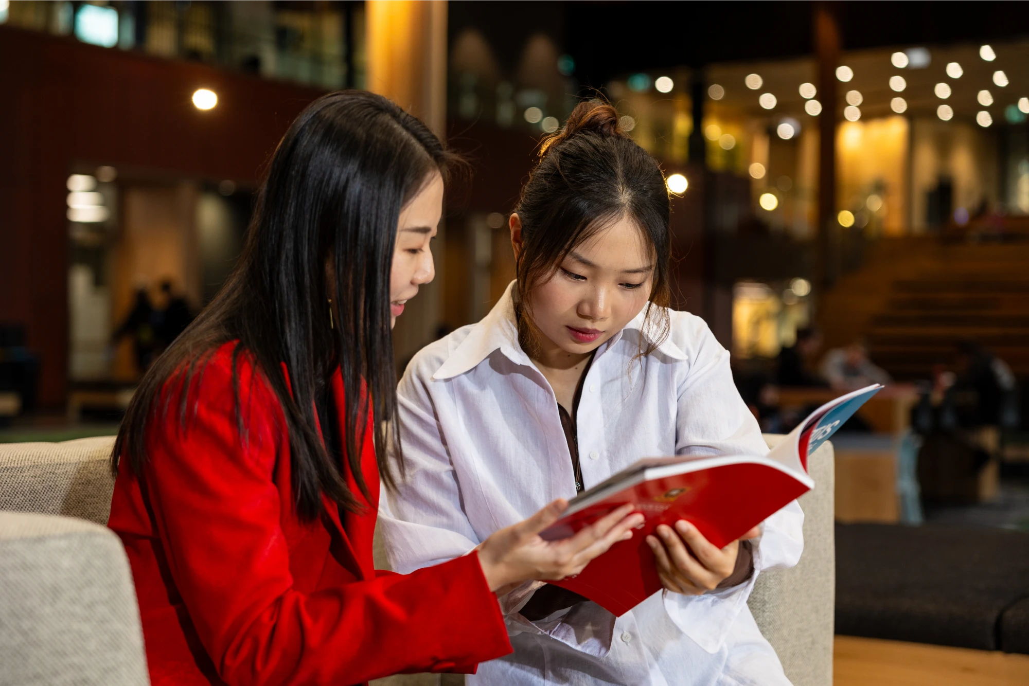 two-students-reading-prospectus-pa 