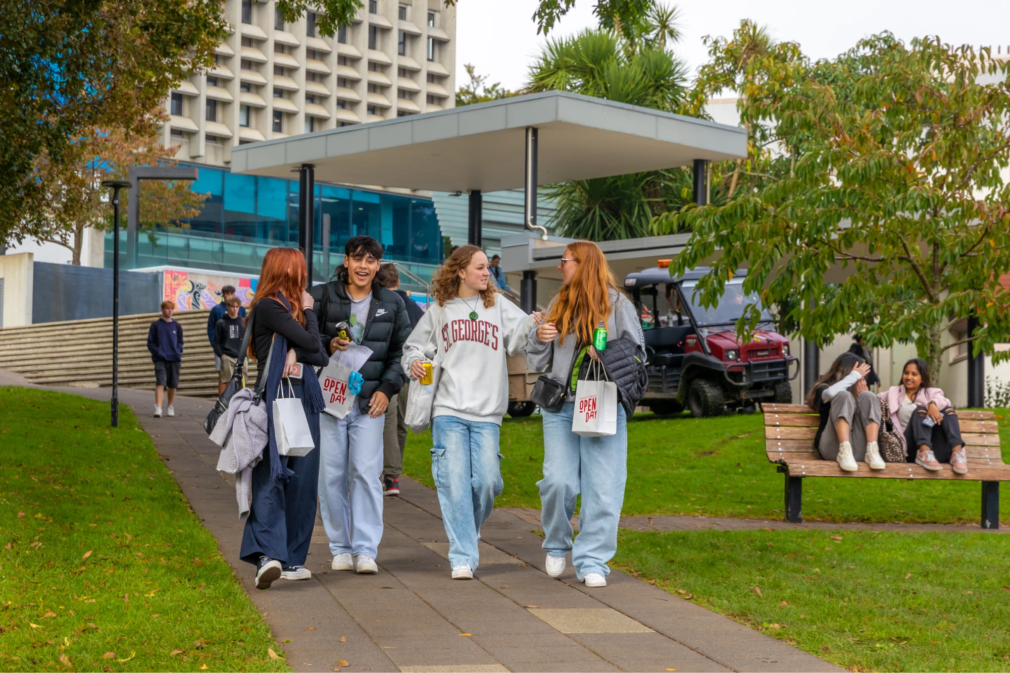 group-of-students-walking-outside-openday