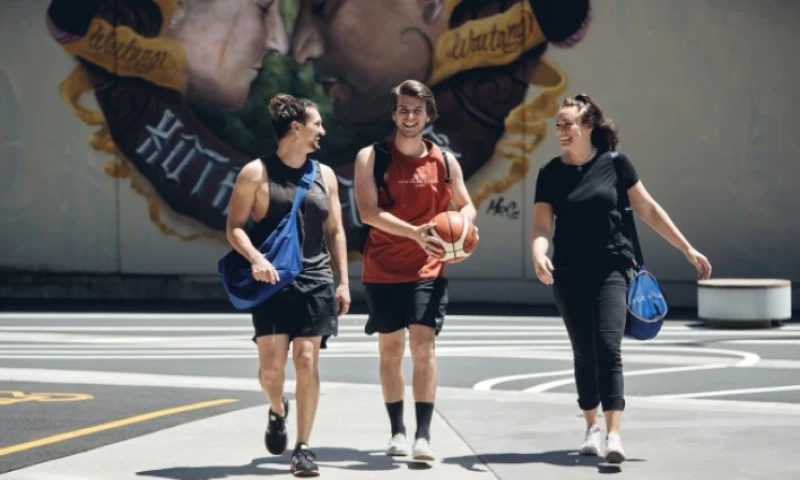 People on a basketball field. 