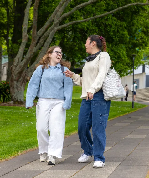 students-walking-by-campus-green-mobile