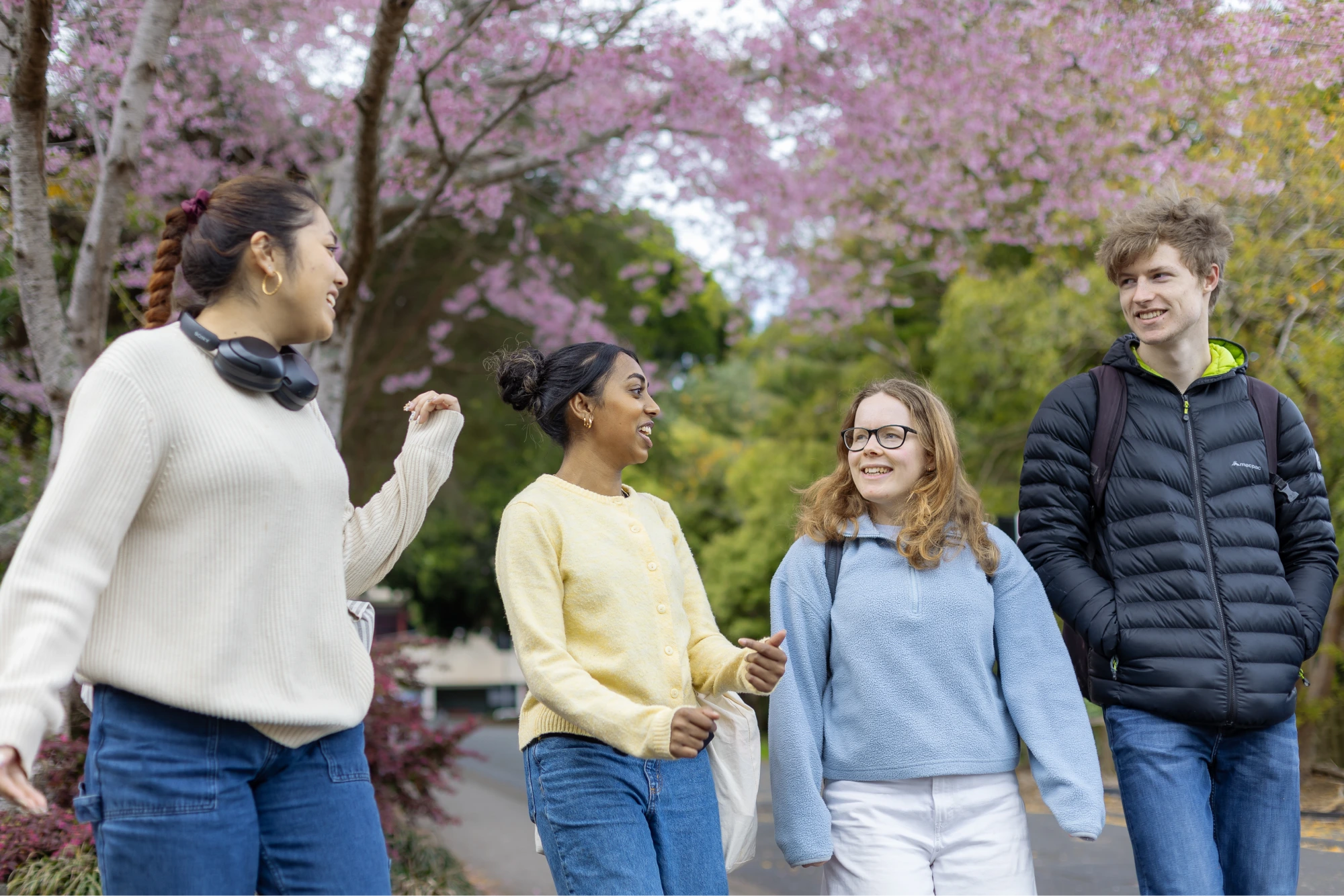 group-of-students-walking-outside