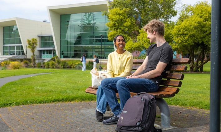 students-sitting-outside-gapa-building