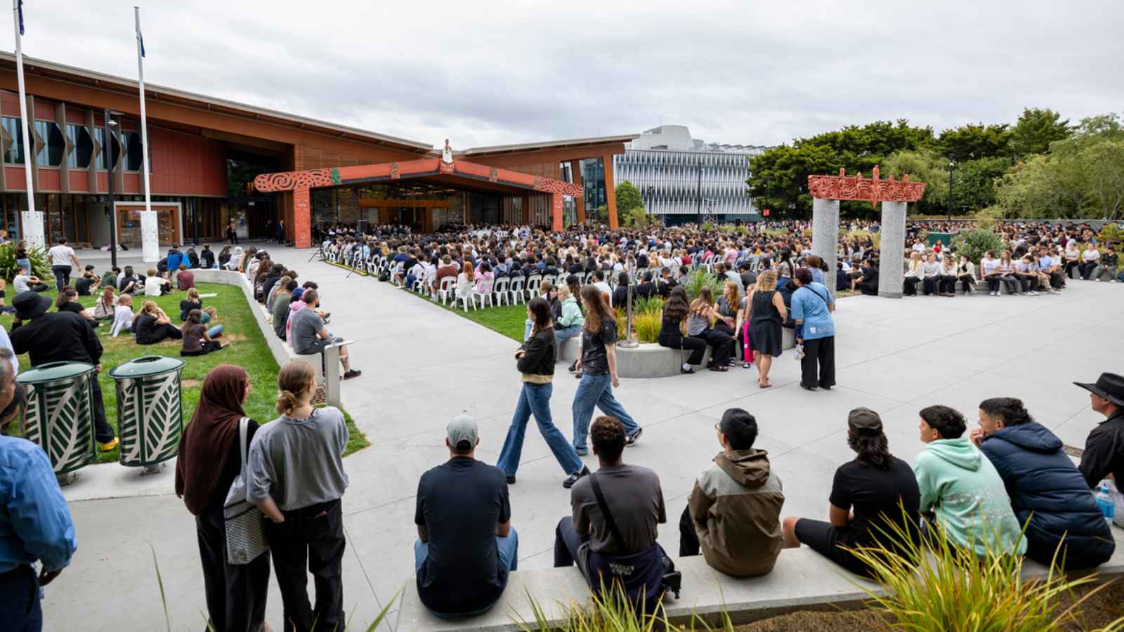 Students gather outside The Pā during orientation week at the University of Waikato